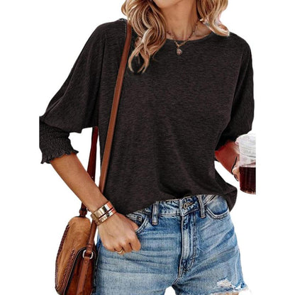 Black lightweight short-sleeve blouse with gathered cuffs and relaxed fit