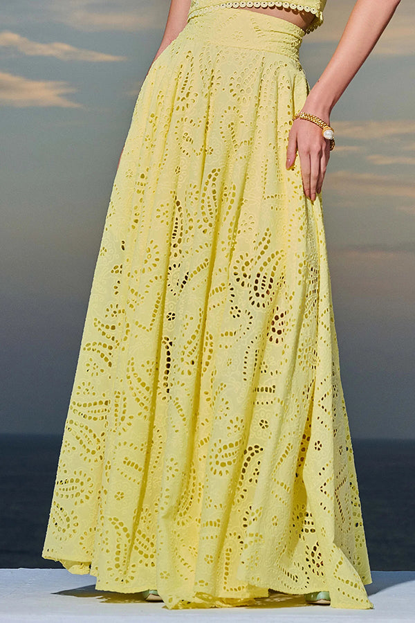 High-waist maxi skirt in yellow with allover eyelet embroidery and tiered flare