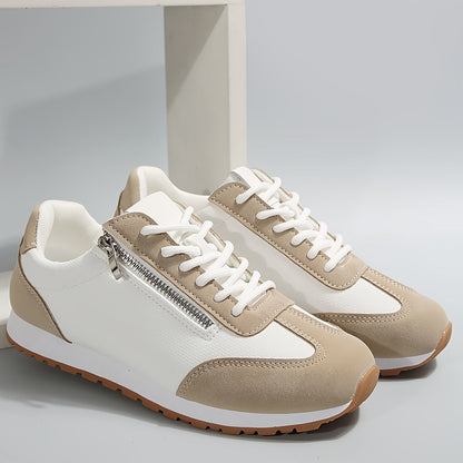 Casual low-top sneakers, white with beige panels, lace-up and zip detail.