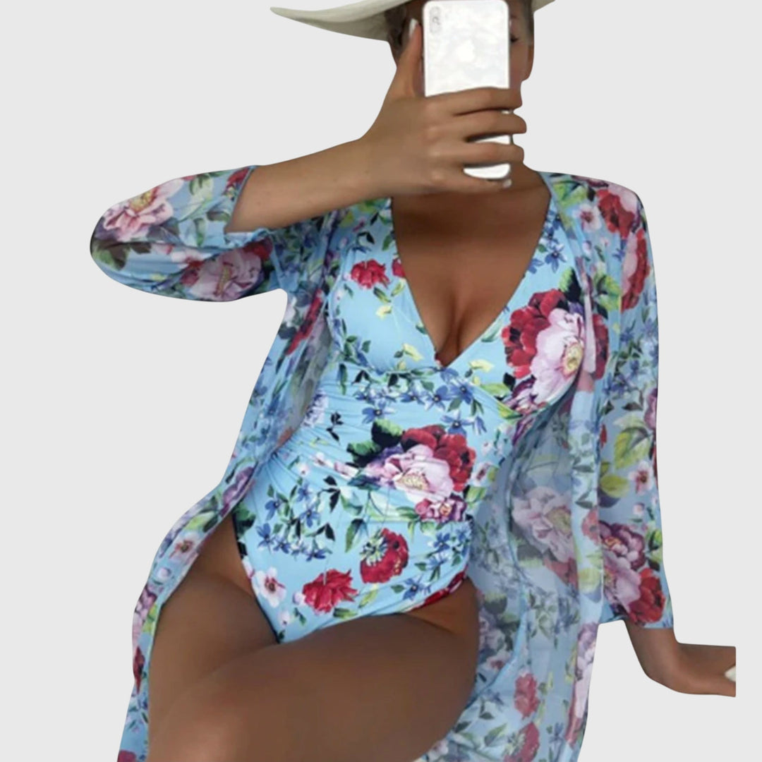 Floral light blue swimsuit set with V-neck top, high-rise bottoms, and long robe