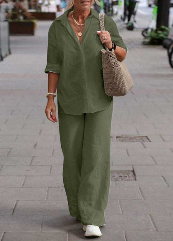 Olive-green two-piece set: button-up top with wide-leg trousers.