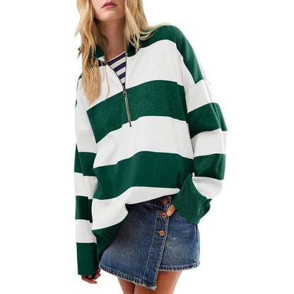 Oversized turtleneck sweater with green-and-white striped half-zip