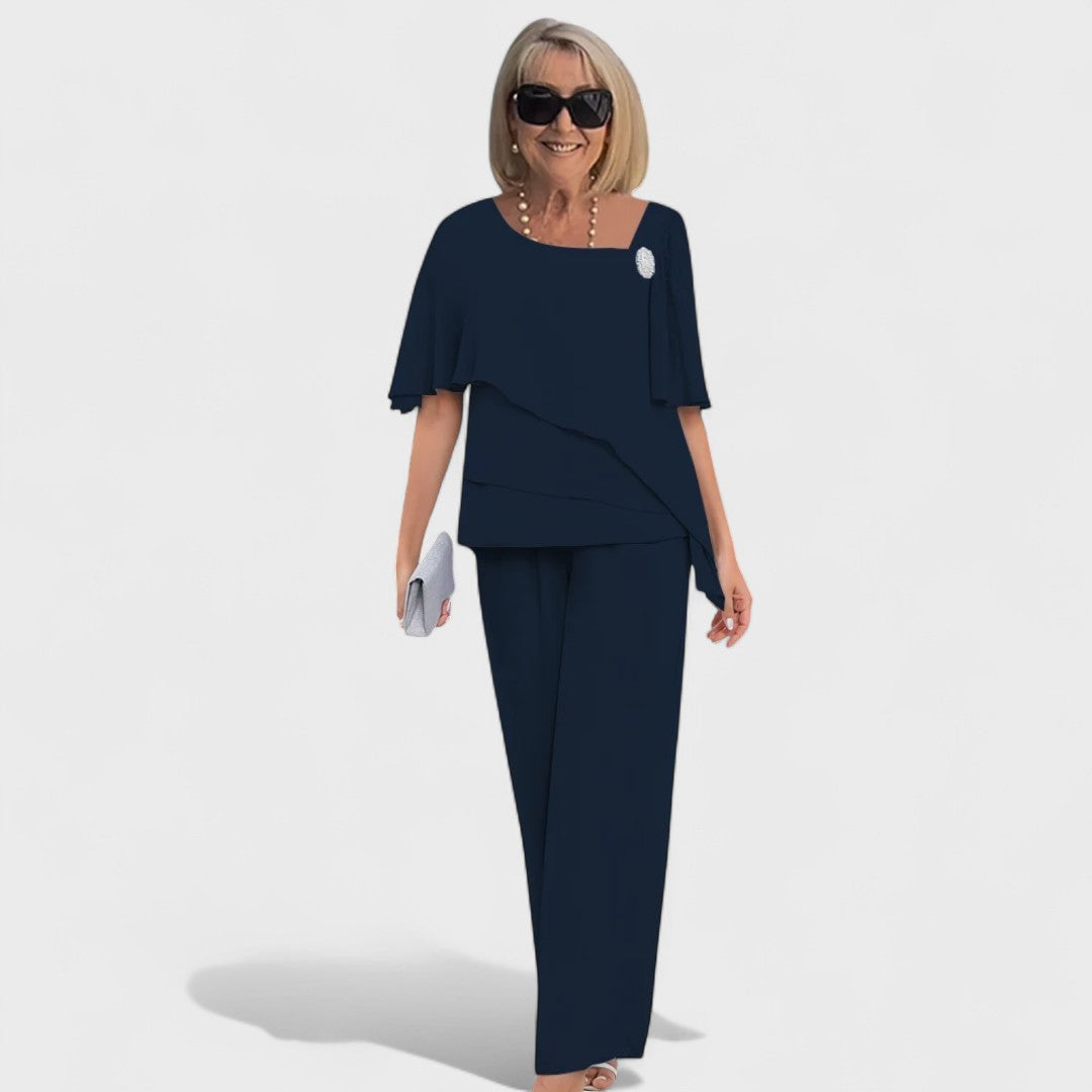 Two-piece set with layered short-sleeve top and navy tapered trousers