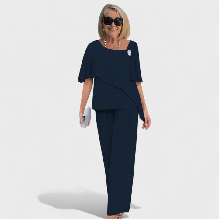 Two-piece set with layered short-sleeve top and navy tapered trousers