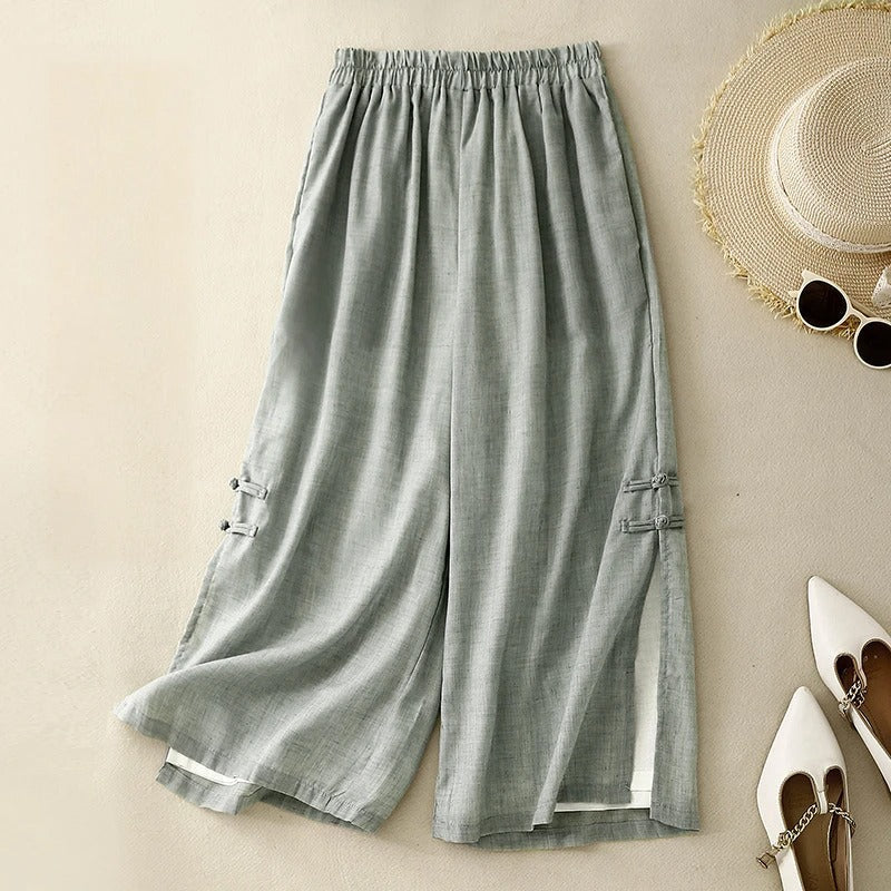 Green linen casual pants with elastic waistband and wide cropped legs