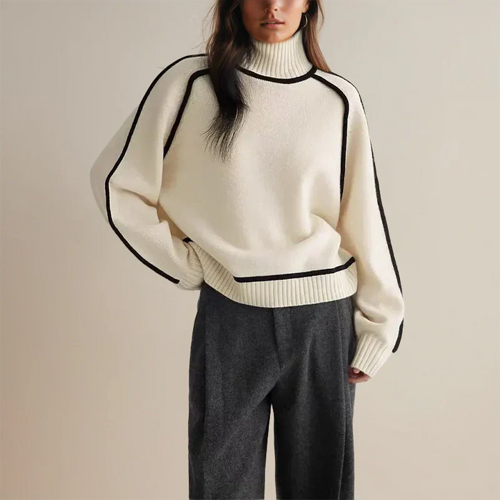 White turtleneck sweater with ribbed collar and contrast black trim