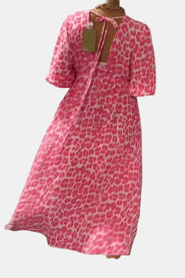 Pink leopard-print midi dress with keyhole back and flared sleeves