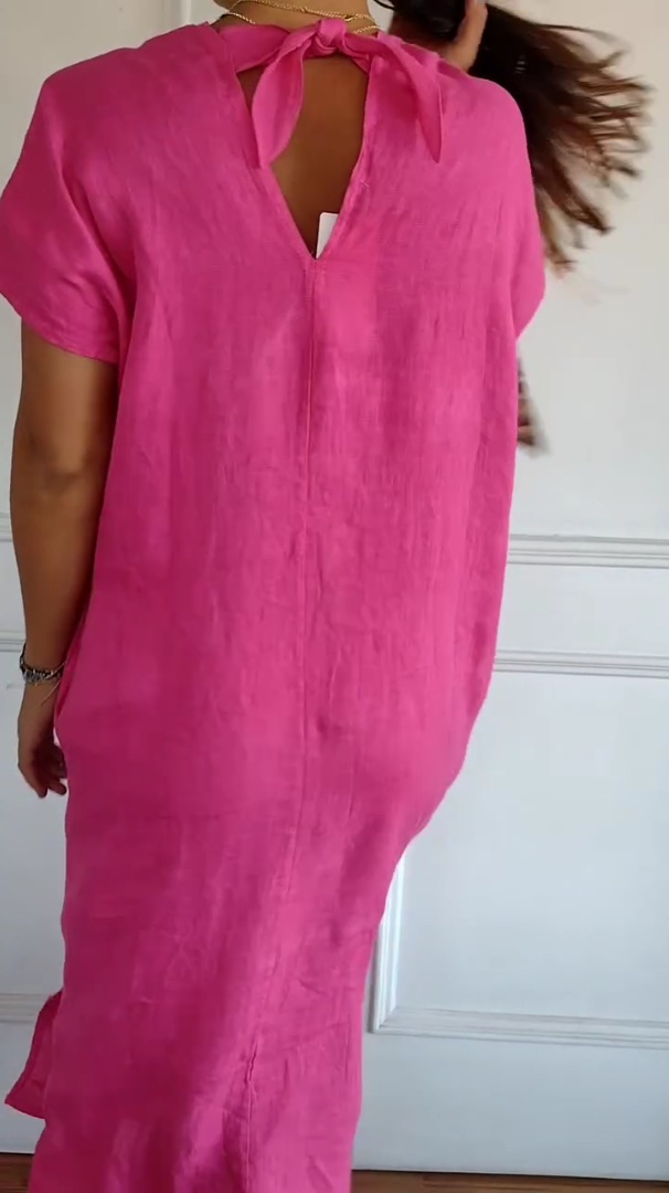 Pink dress back with open V cutout and bow tie, short sleeves