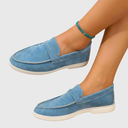 Sky blue suede orthopedic loafers, slip-on moc toe with stitched seams and white sole
