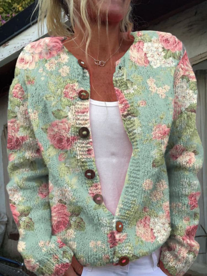 Blue-green vintage floral cardigan with V-neck and button front, long sleeves