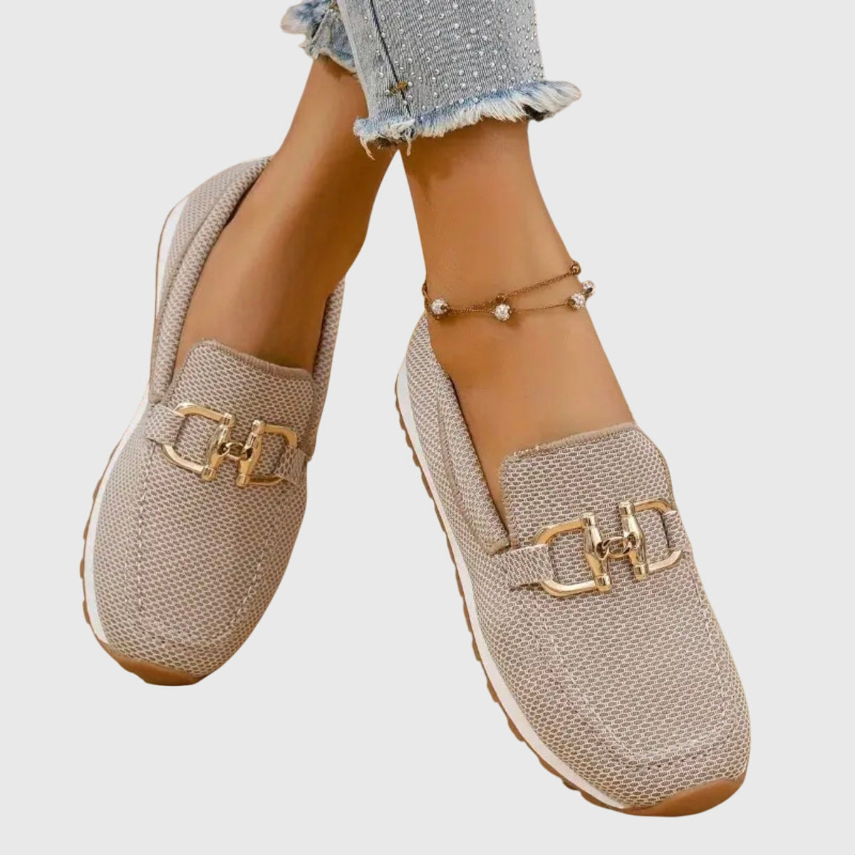 Beige textured loafer sneakers with gold-toned buckle detail