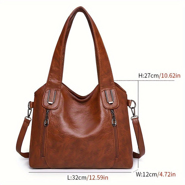 Lumi tote bag open interior with zip closure and side hardware details