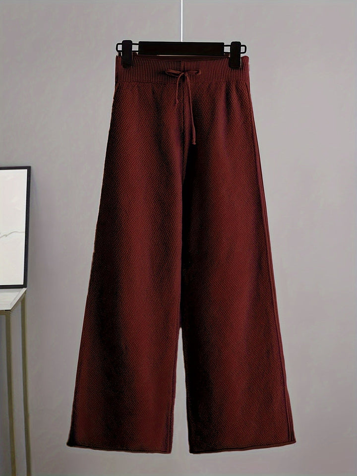 Dark red wide-leg knit trousers with drawstring waistband