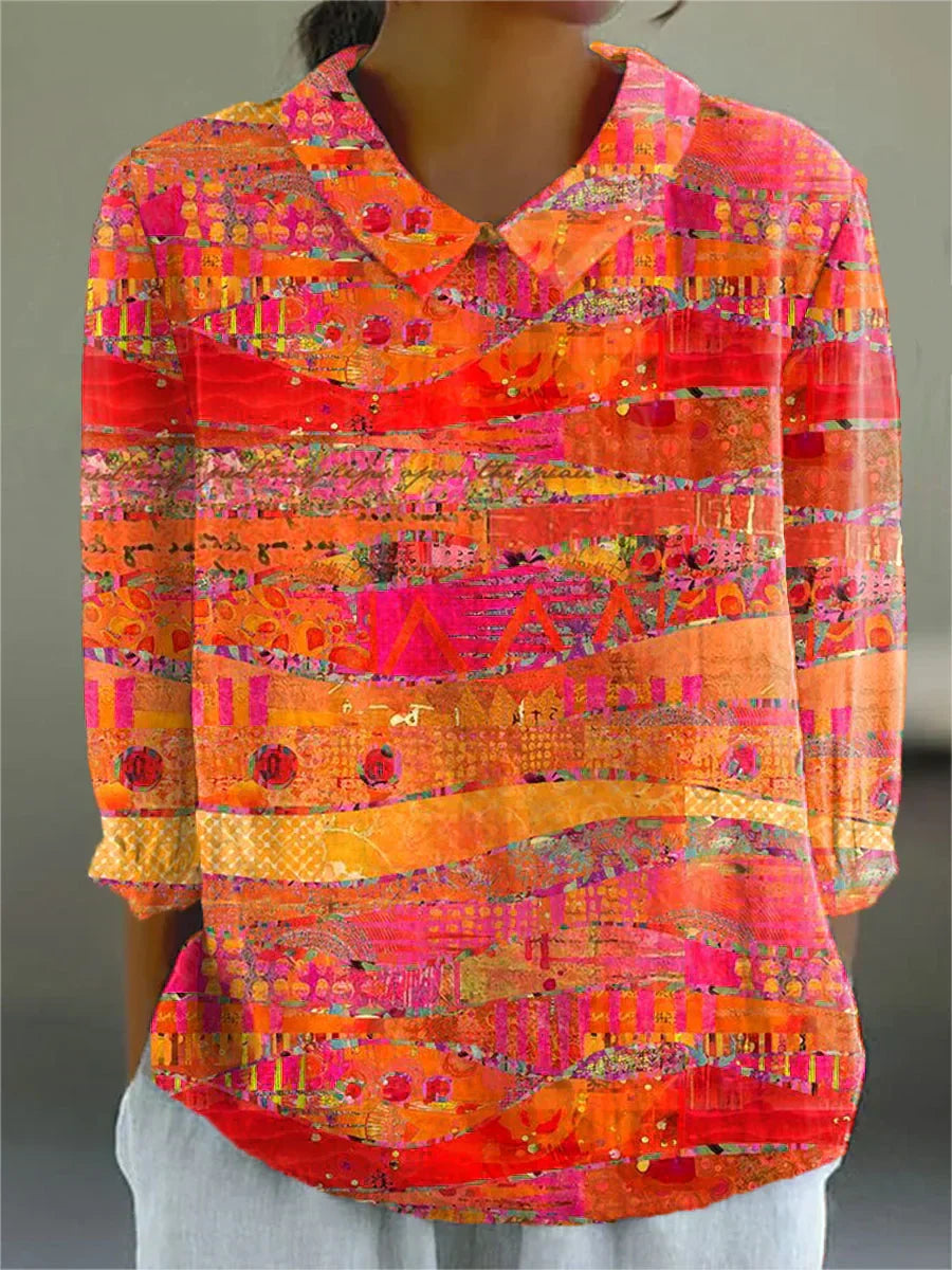 Vibrant mosaic blouse with V-neck, long sleeves, multicolor geometric print