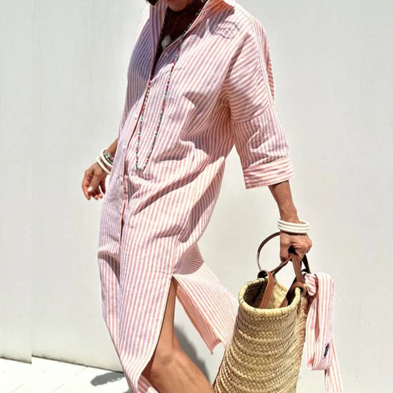 Pink striped button-front summer dress with elbow-length sleeves and side slit