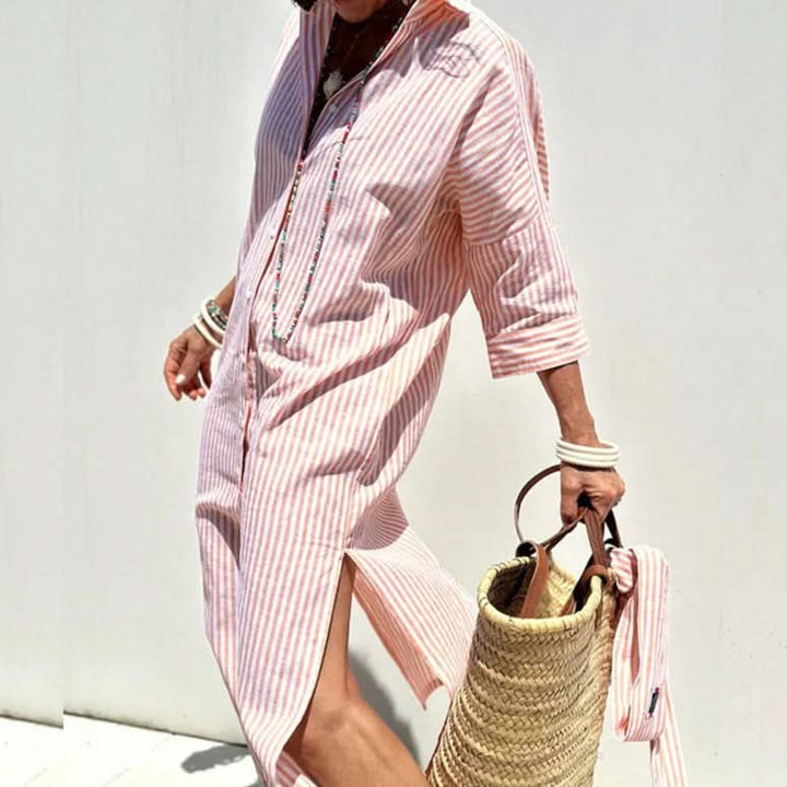 Pink striped button-front summer dress with elbow-length sleeves and side slit