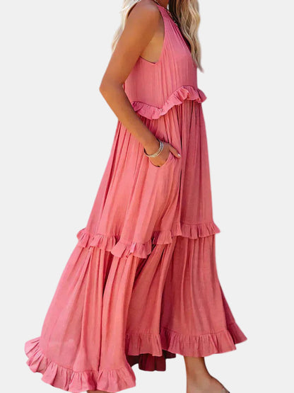Pink tiered long dress with sleeveless halter cut and ruffled maxi skirt layers