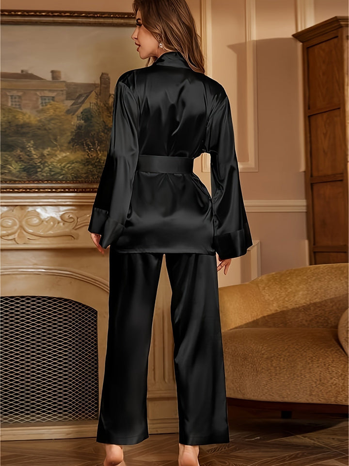 Women’s satin robe and pajama set in black, belted robe with wide-leg pants (back view)