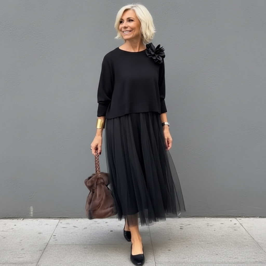Black layered knit dress set with 3/4 sleeves, shoulder flower detail, pleated tulle midi