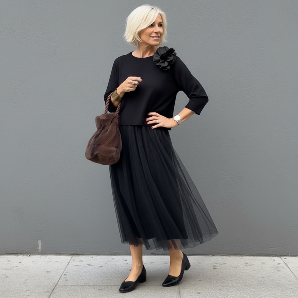 Black knit layered dress set with shoulder flower detail and tulle midi skirt