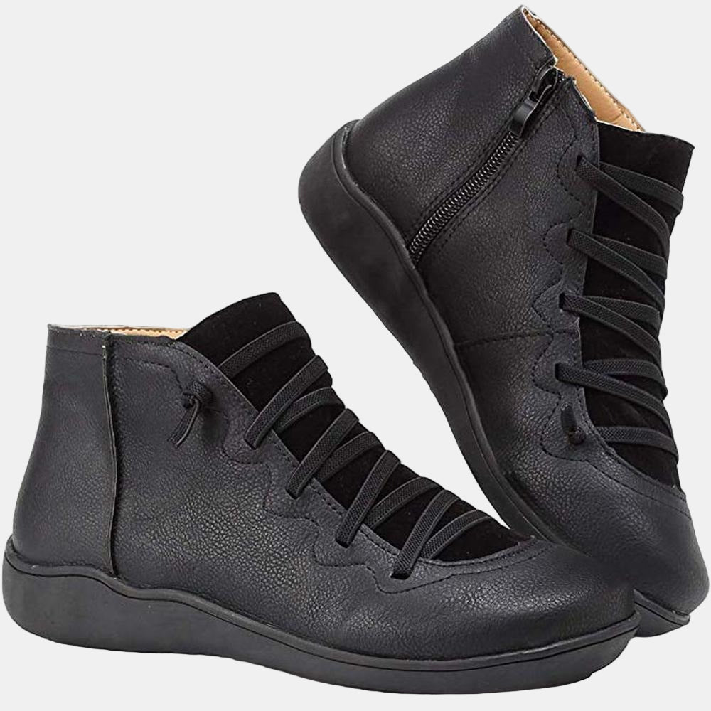 Black lace-up ankle boots with side zipper, dark laces, and flat rubber sole