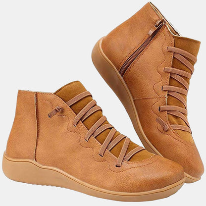 Brown lace-up ankle boots with side zipper and padded collar, flat rubber sole