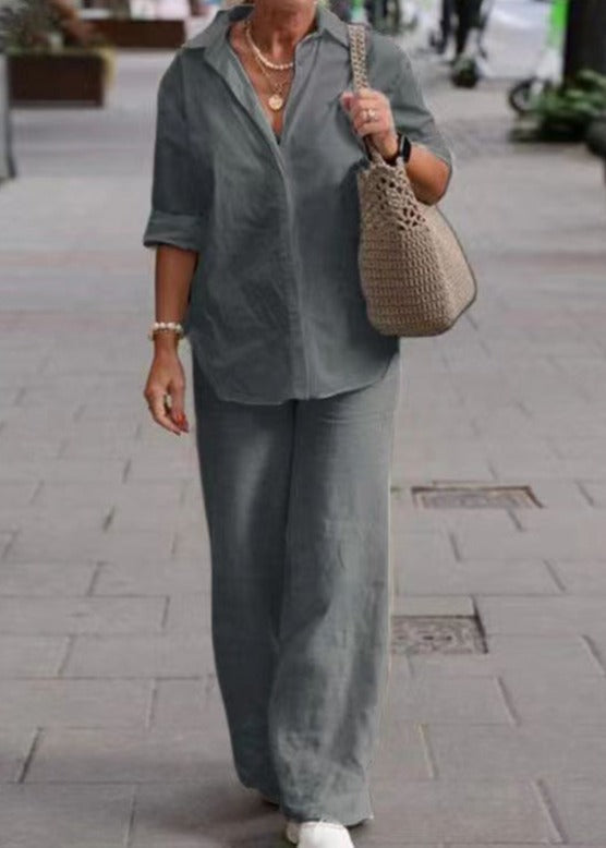 Charcoal two-piece set: button-up top with wide-leg trousers.