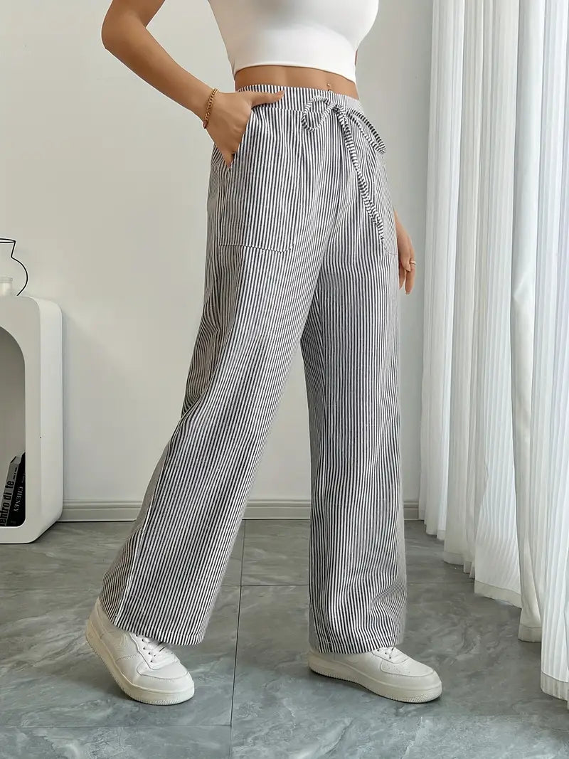 Striped wide-leg pants with drawstring waist and side pockets, black-and-white vertical stripes