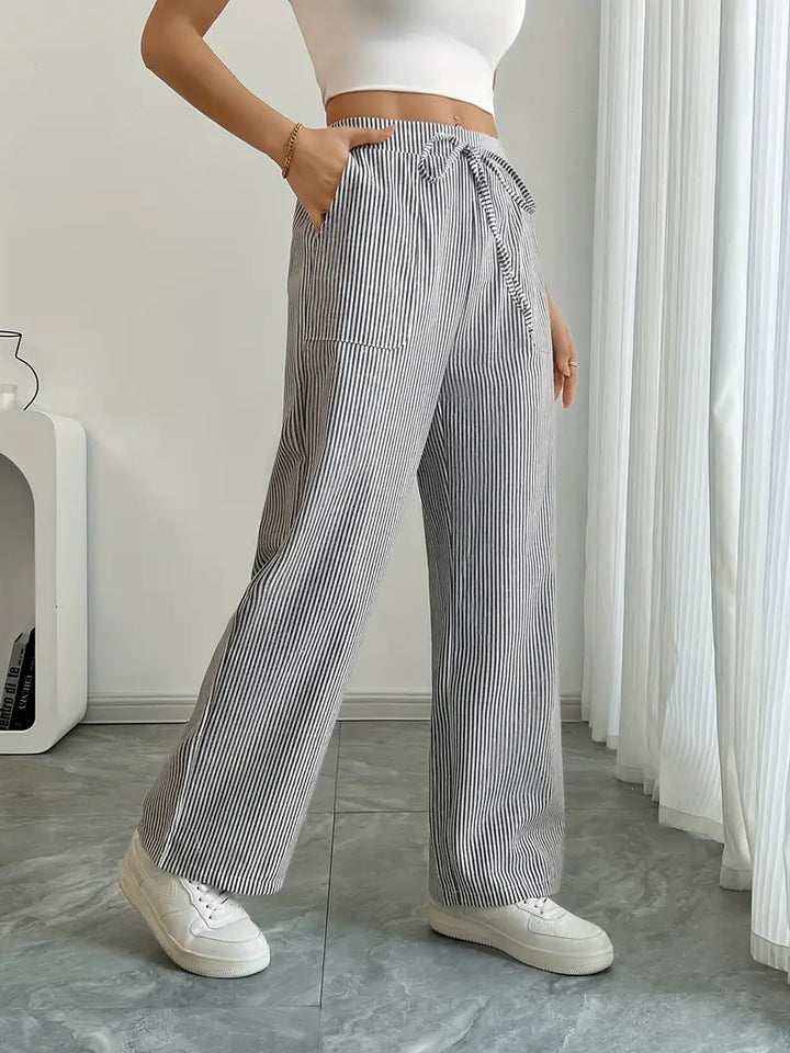 Striped wide-leg pants with drawstring waist and side pockets, black-and-white vertical stripes