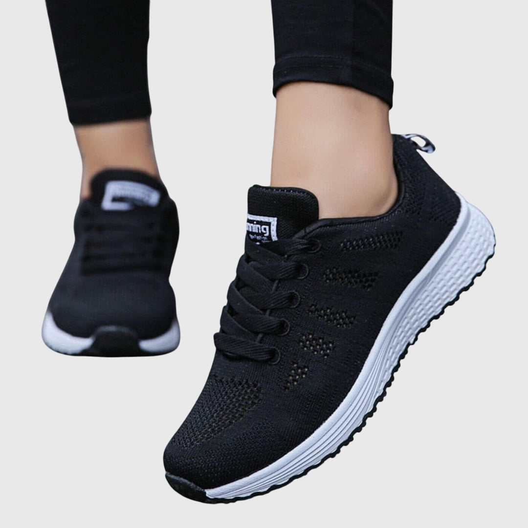 Women's slim sport shoes, black knit lace-up upper with textured white sole