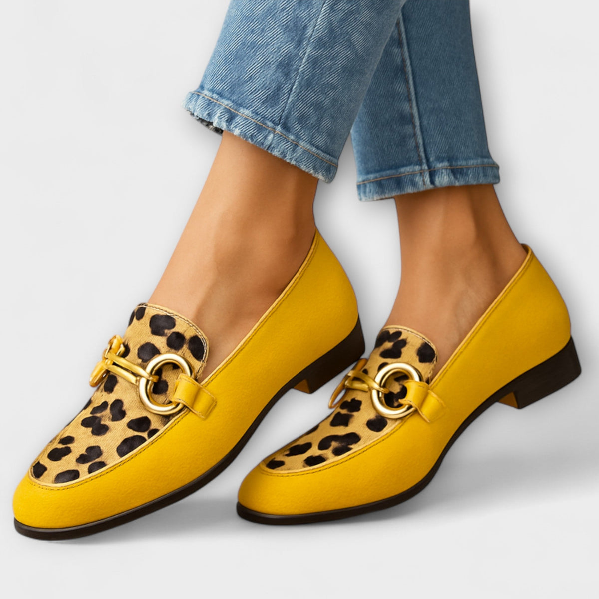 Yellow accent loafers with leopard-print penny strap and gold-tone hardware, low heel.