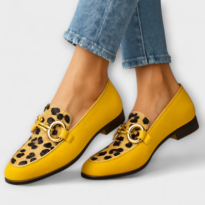Yellow accent loafers with leopard-print penny strap and gold-tone hardware, low heel.