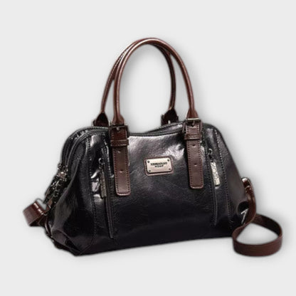 Vintage leather-look shoulder bag in dark/black with top handles and crossbody strap