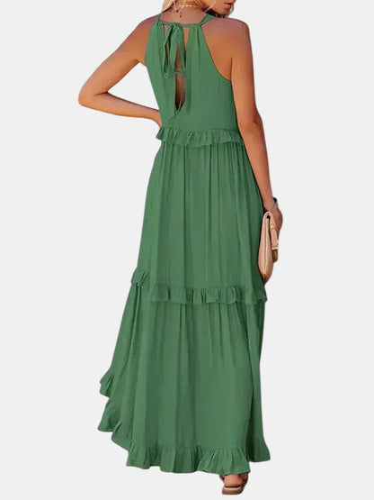 Green tiered long dress with sleeveless halter and open back keyhole tie