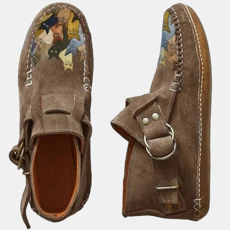Printed ankle boots in brown suede with buckle strap and lace tie, animal print lining