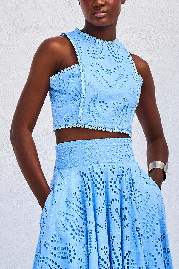 Blue embroidered sleeveless crop top and high-waist maxi skirt set, close-up of bodice