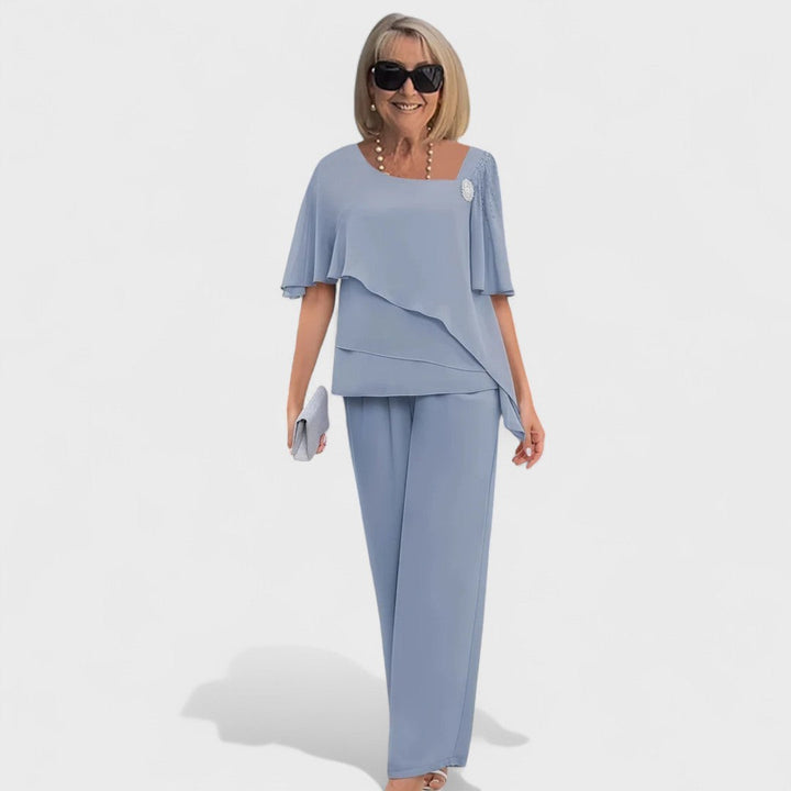 Two-piece set with layered short-sleeve top and light blue tapered trousers