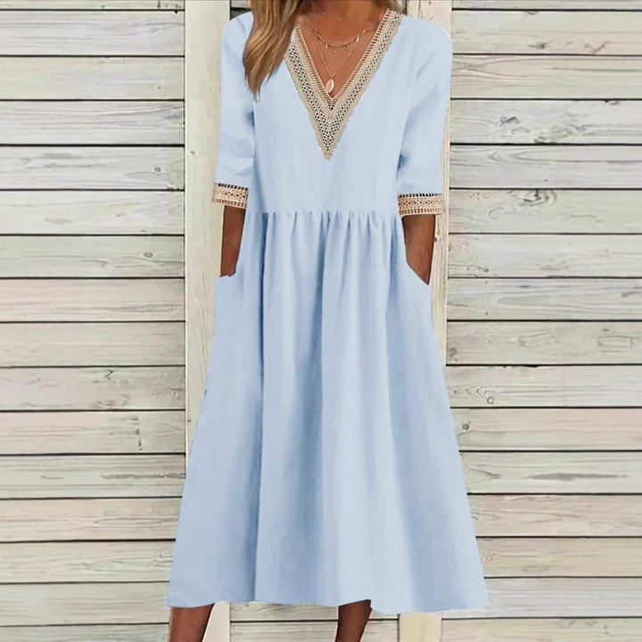 Lace-collar mid-length dress in light blue with V neckline and lace-trimmed three-quarter sleeves