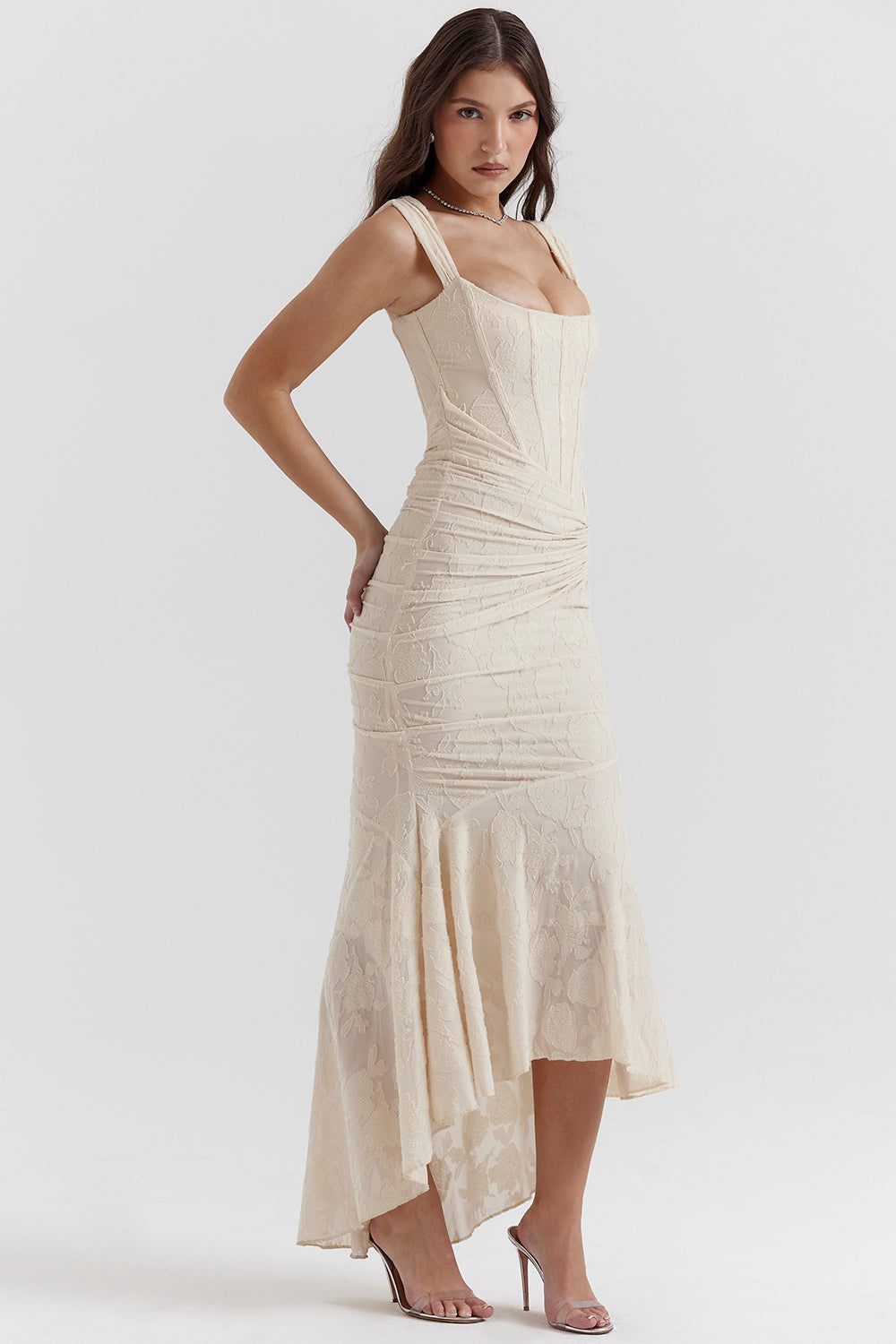 Beige evening dress with square neckline, ruched corset bodice, asymmetric flared hem