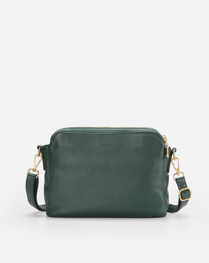 Jovie sleek three-layer crossbody bag, deep green, front zip with gold-tone hardware and strap