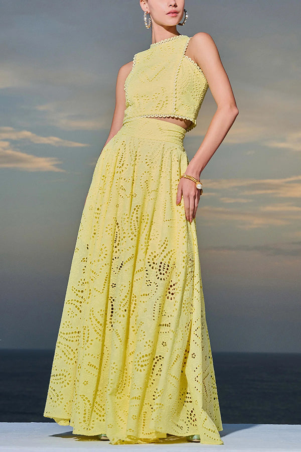 Yellow embroidered sleeveless crop top and high-waist maxi skirt set with scalloped trim