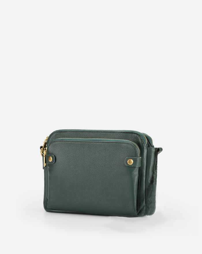 Jovie sleek three-layer crossbody bag in deep green with top zip and front snap pocket