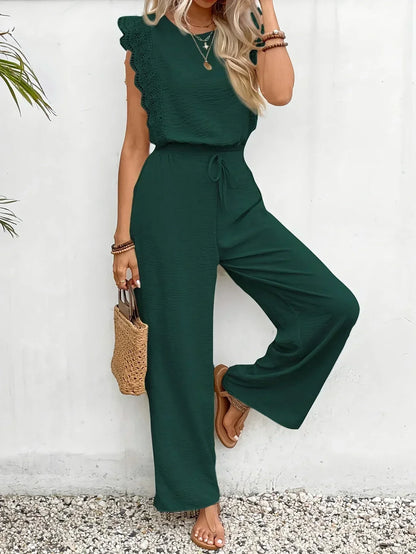 Two-piece set in deep green: lace-trim sleeveless top and wide-leg trousers