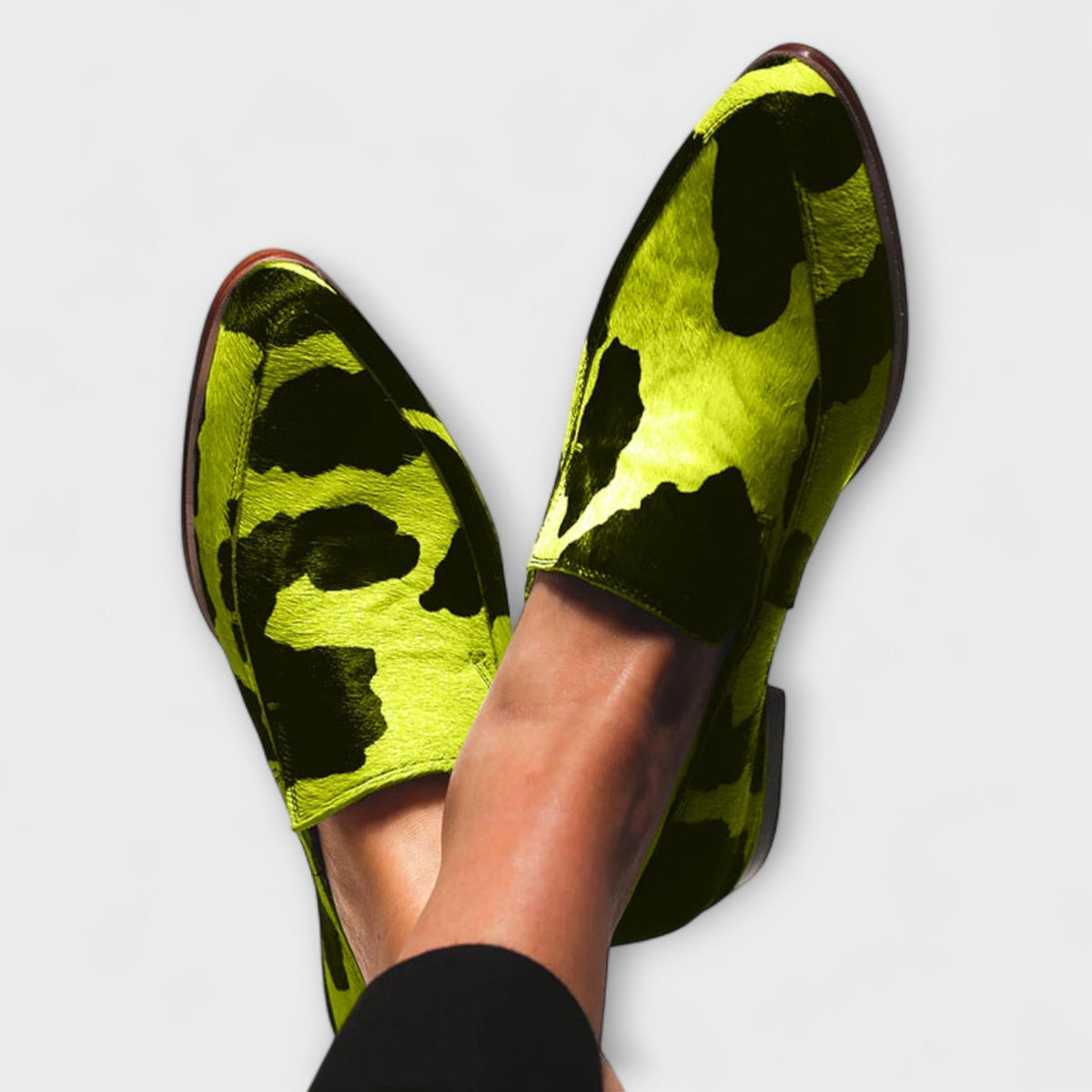 Cow print slip-on shoes, lime green with black spots, pointed toe
