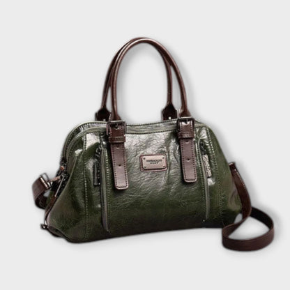 Vintage leather-look shoulder bag in green with top handles and crossbody strap