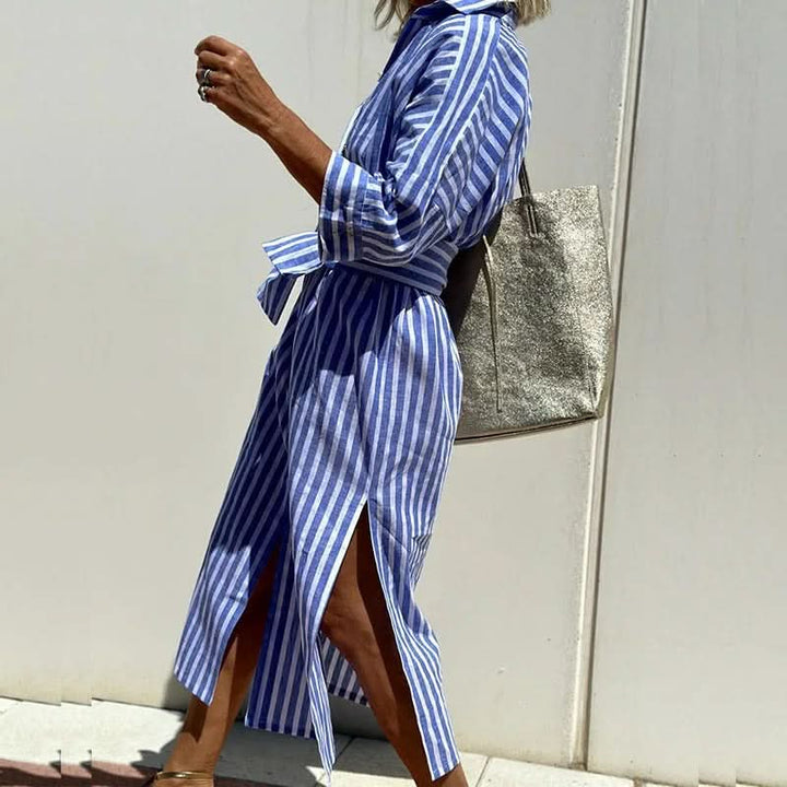 Blue striped summer dress with button front, tied waist, and long side slits