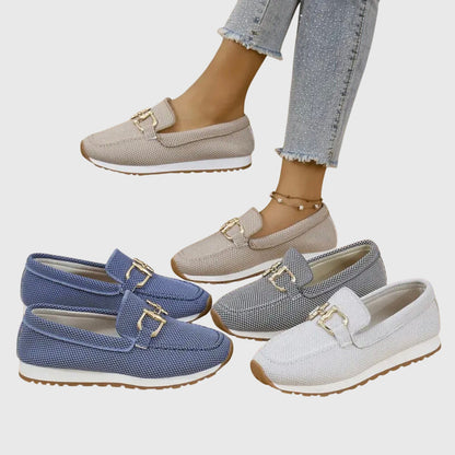 Set of beige, blue, and white loafer sneakers with gold-toned buckle accents