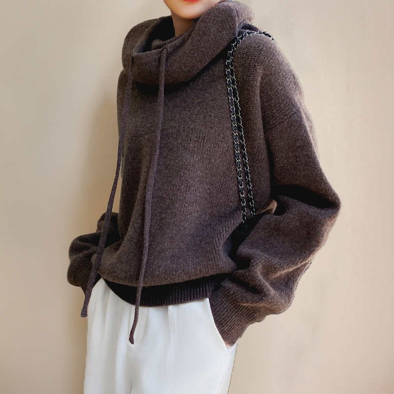 Brown winter hoodie with hood and drawstring ties, ribbed cuffs and hem