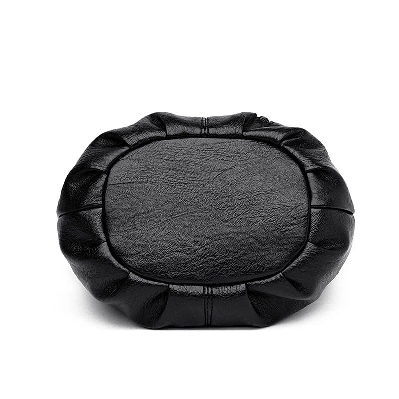 Black multi-layer handbag with oval front panel and padded stitched edges