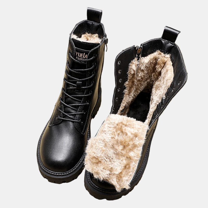 Black lace-up ankle boots with faux fur lining and lug sole